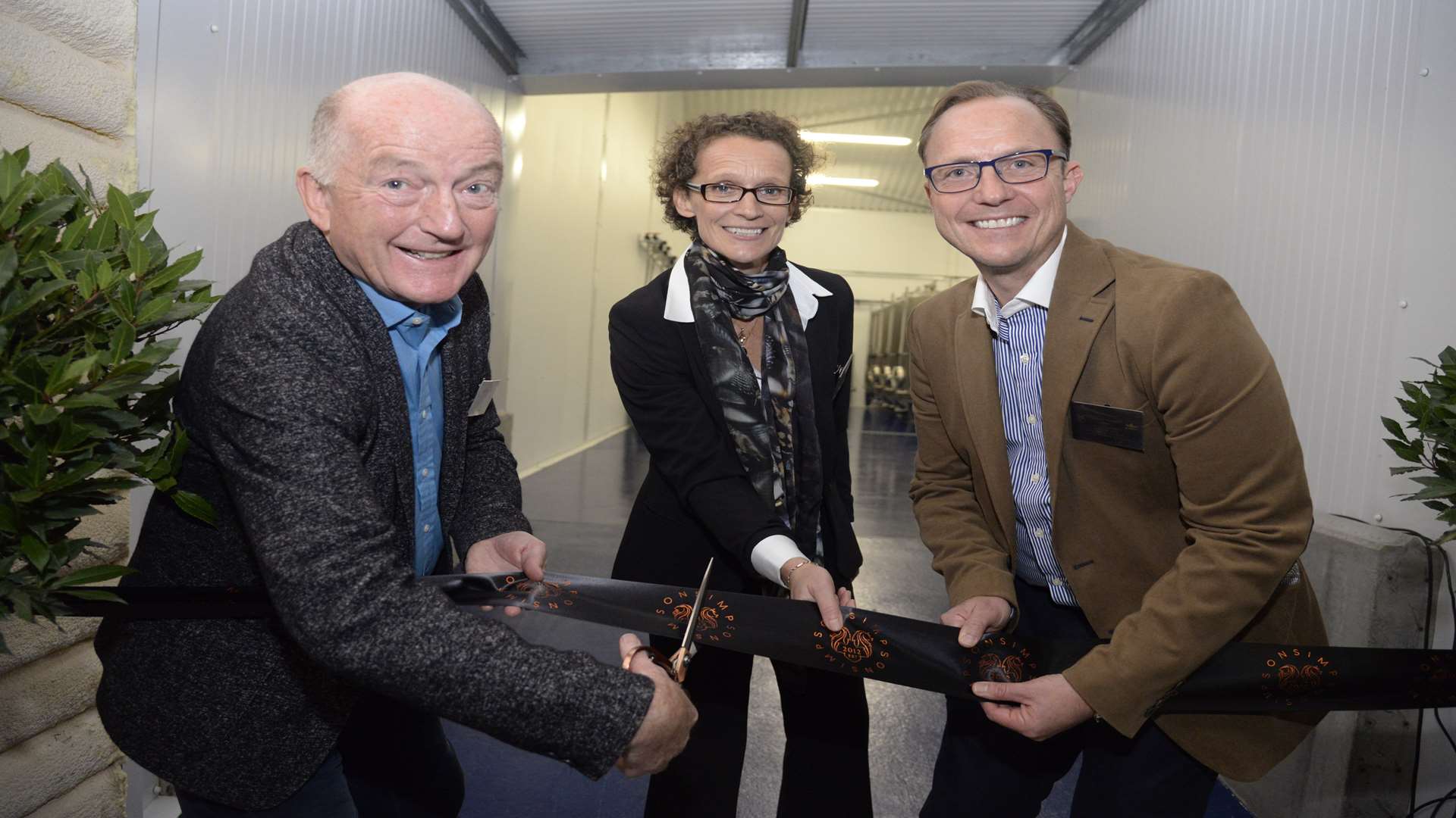 Wine expert Oz Clarke with Ruth and Charles Simpson at the opening of Simpsons Winery at Barham Picture: Chris Davey