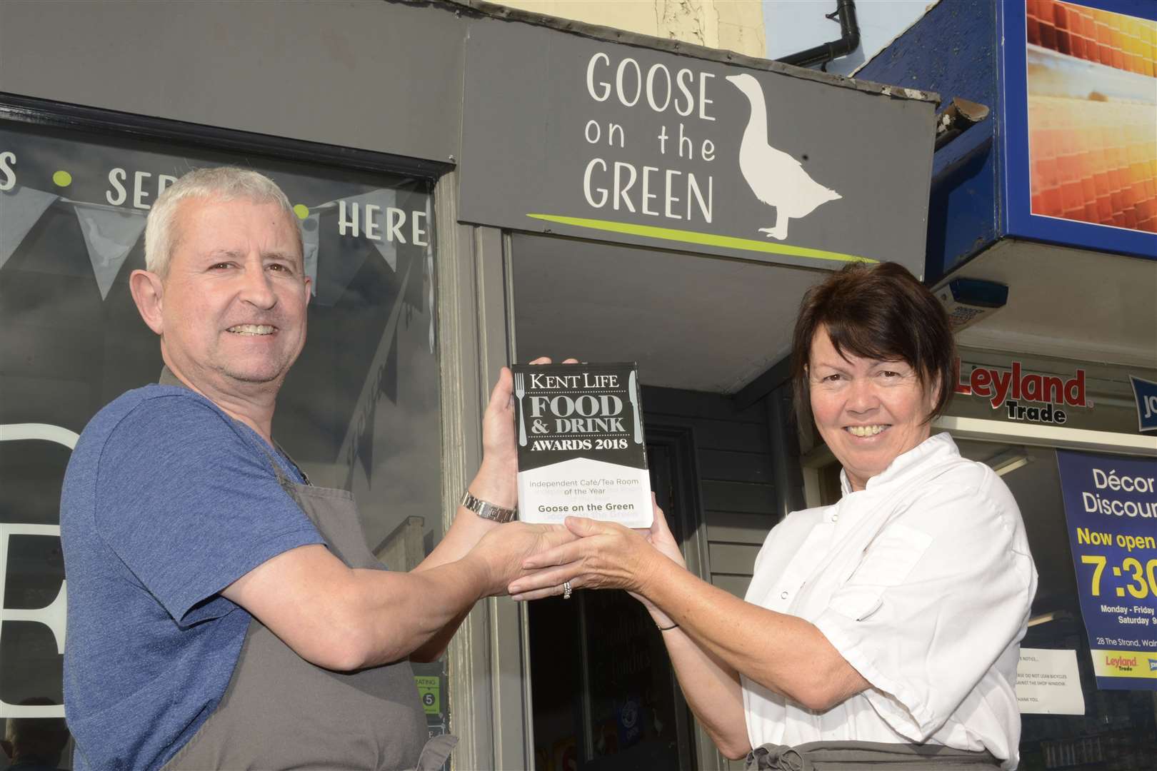The Goose on the Green cafe won a good food and drink award in 2018. Pictured are owners Alistair and Lisa Bassett with the award. Picture: Paul Amos
