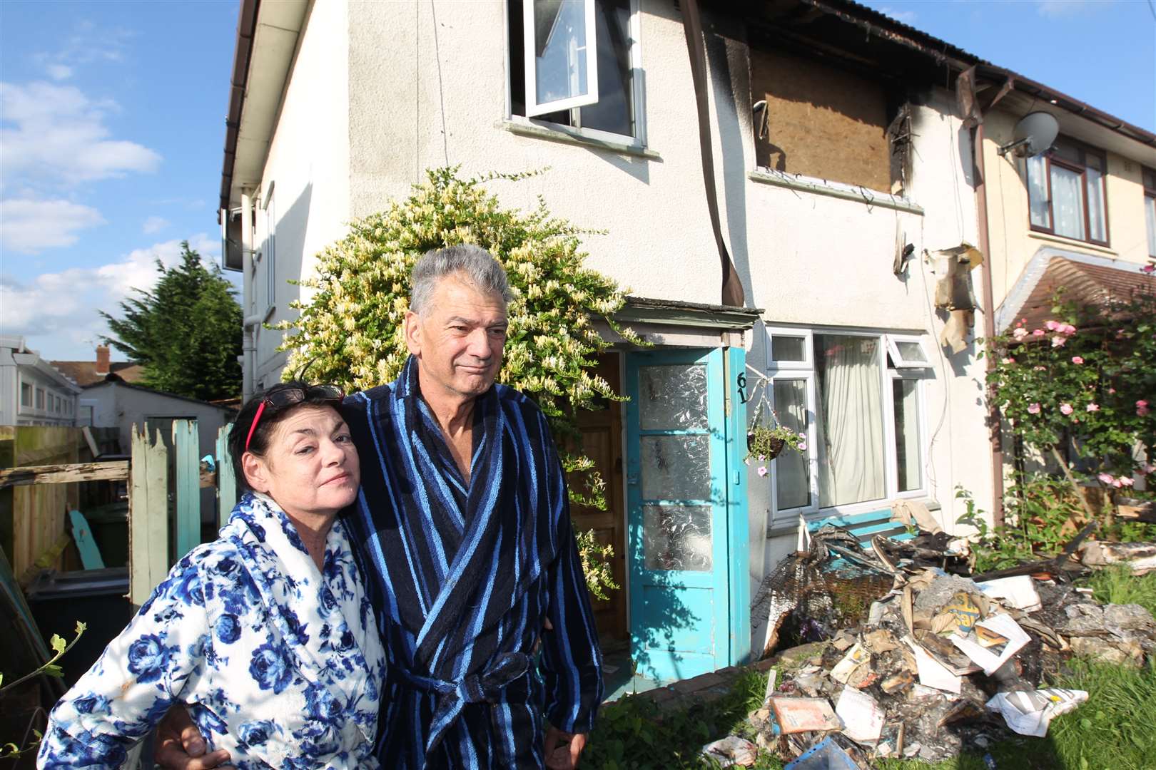 Elizabeth Stephenson with Robin Verkely, whose house was burnt down