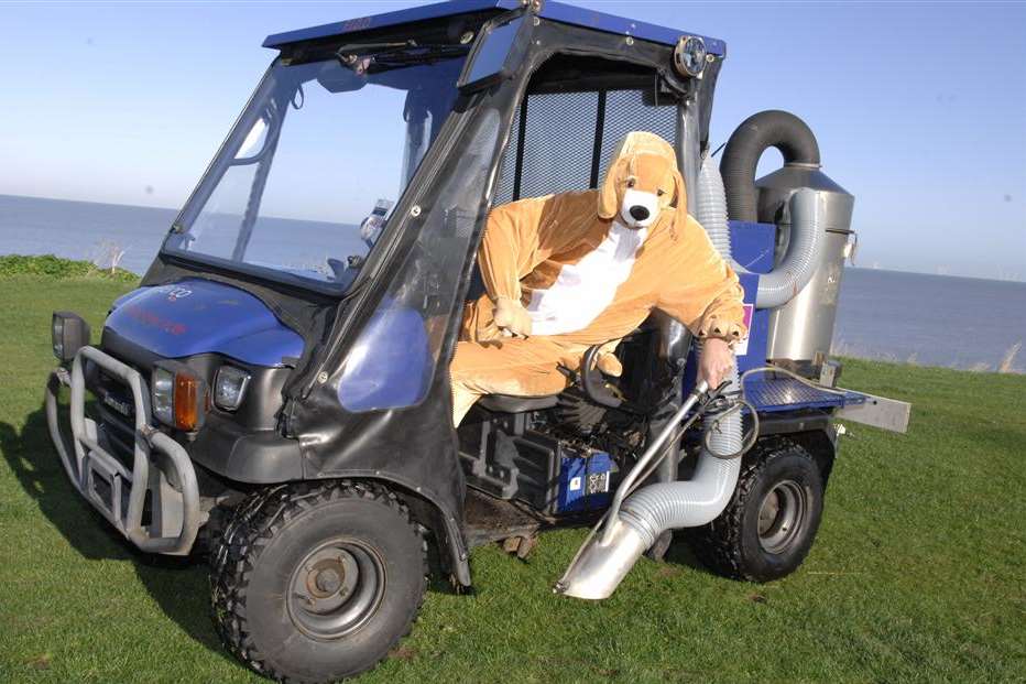 Scoop the Dog takes control of the city council's Fido dog poo clearing machine