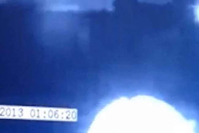 An unexplained object appears at the bottom of this CCTV image