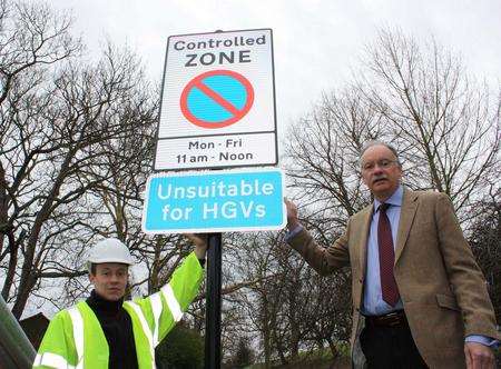 KCC's Bryan Sweetland with one of the new signs in Windmill Hill, Gravesend.