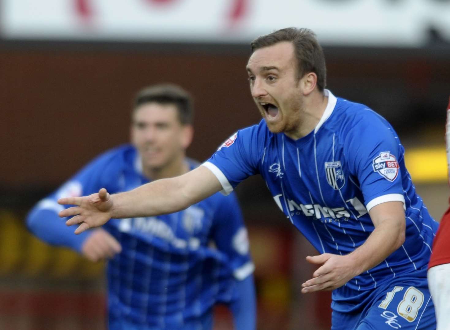 Charlie Lee celebrates scoring for Gillingham at Bristol City in 2014 Picture: Barry Goodwin