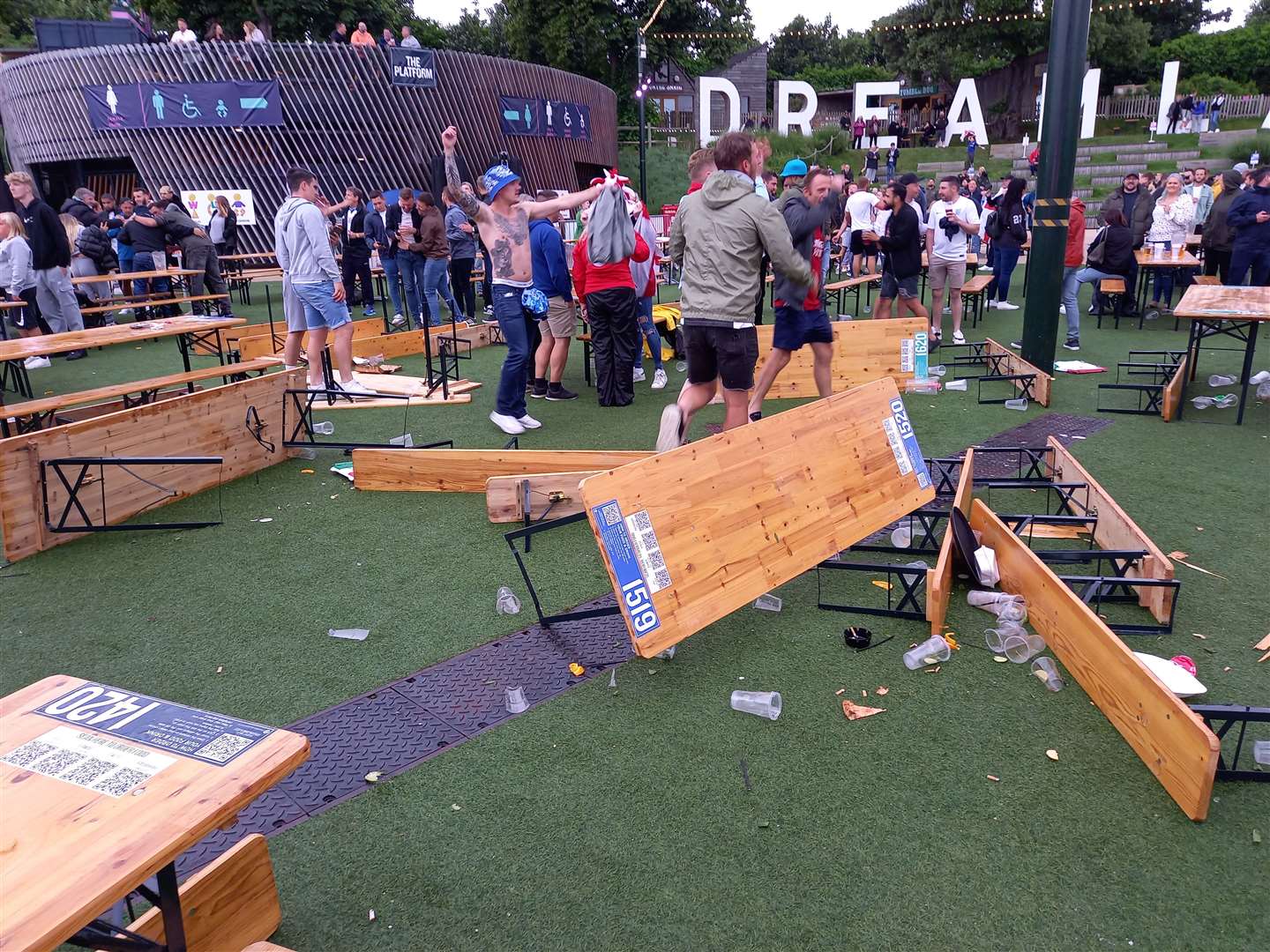 Fans overturned tables at the end of the England vs. Germany match