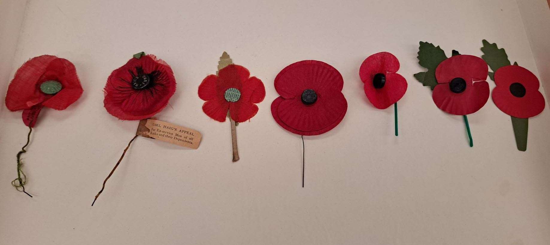 Poppy styles across the ages, from left, the very first silk poppy in 1921, to right, today's plastic-free poppy
