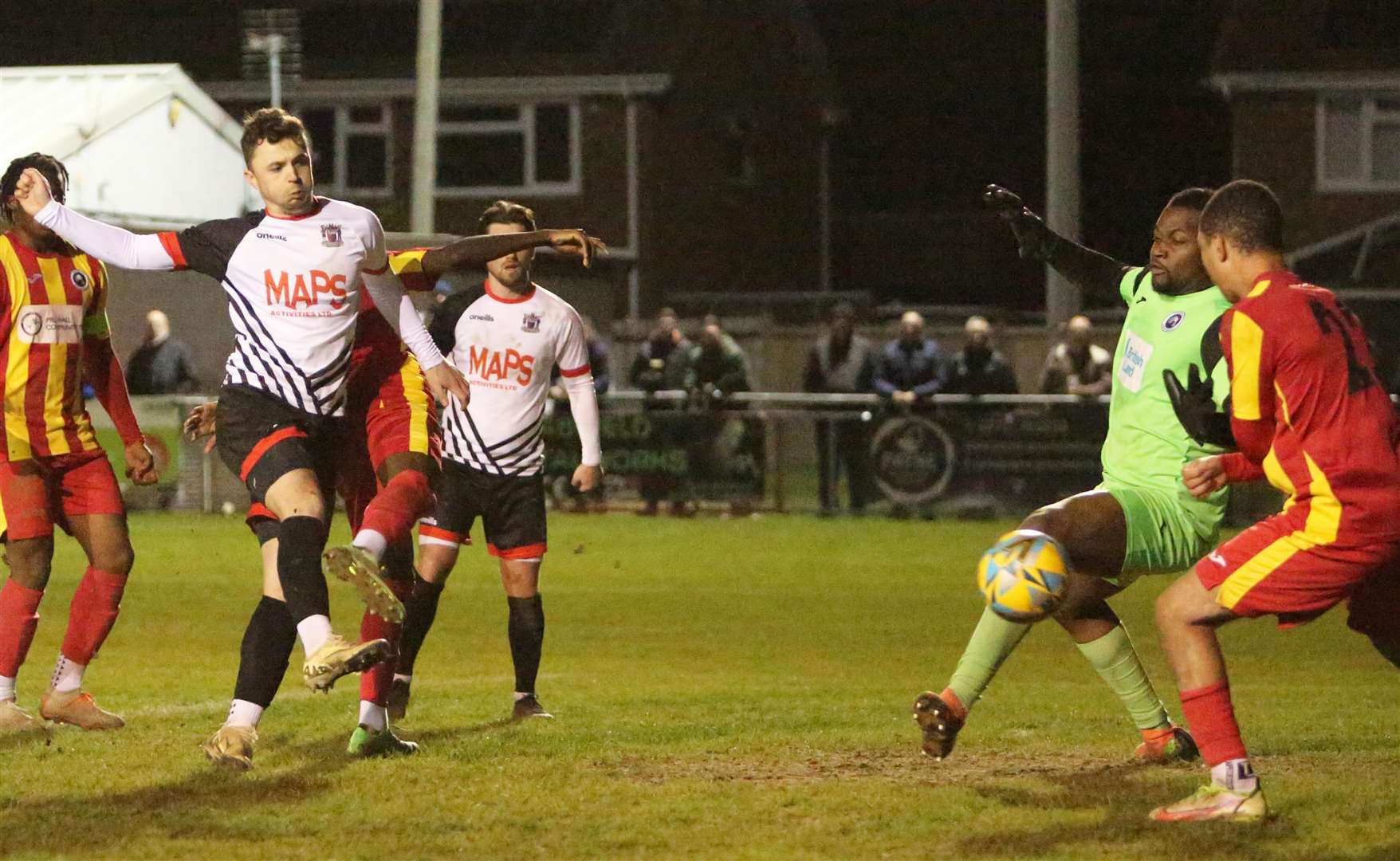 Deal frontman Rory Smith fires past Fisher keeper Mo Otuyo in last Tuesday’s 3-0 win. Picture: Paul Willmott