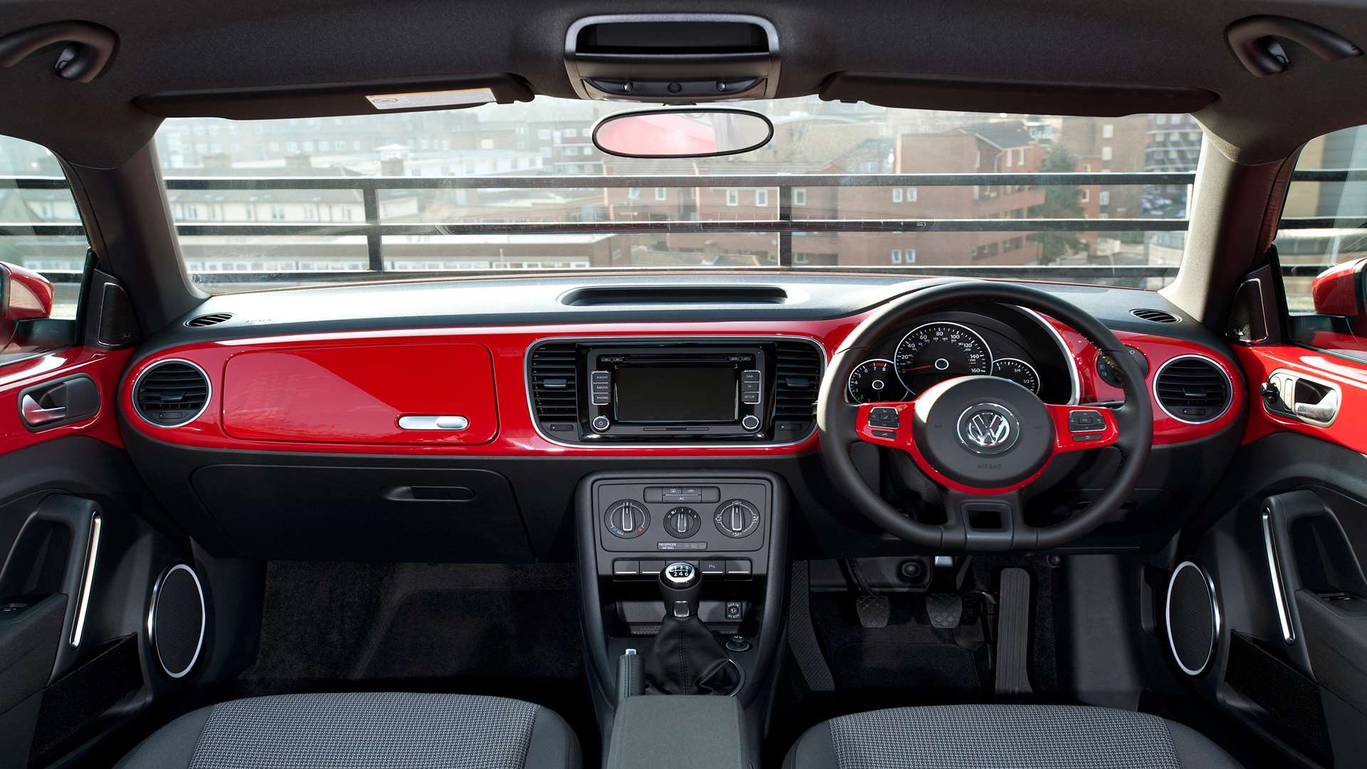 The cabin ambience is lifted by body-coloured inserts on the dash and door panels