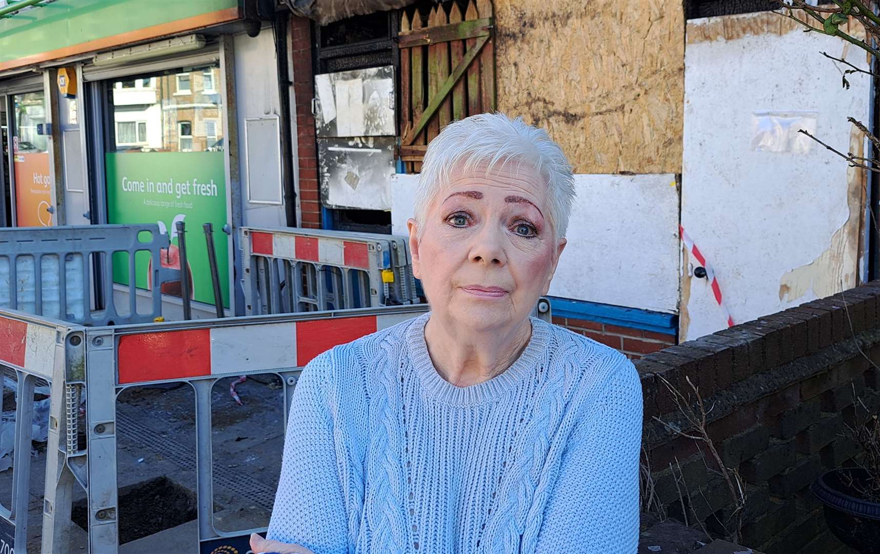 Neighbour Helen Clay outside the wrecked business
