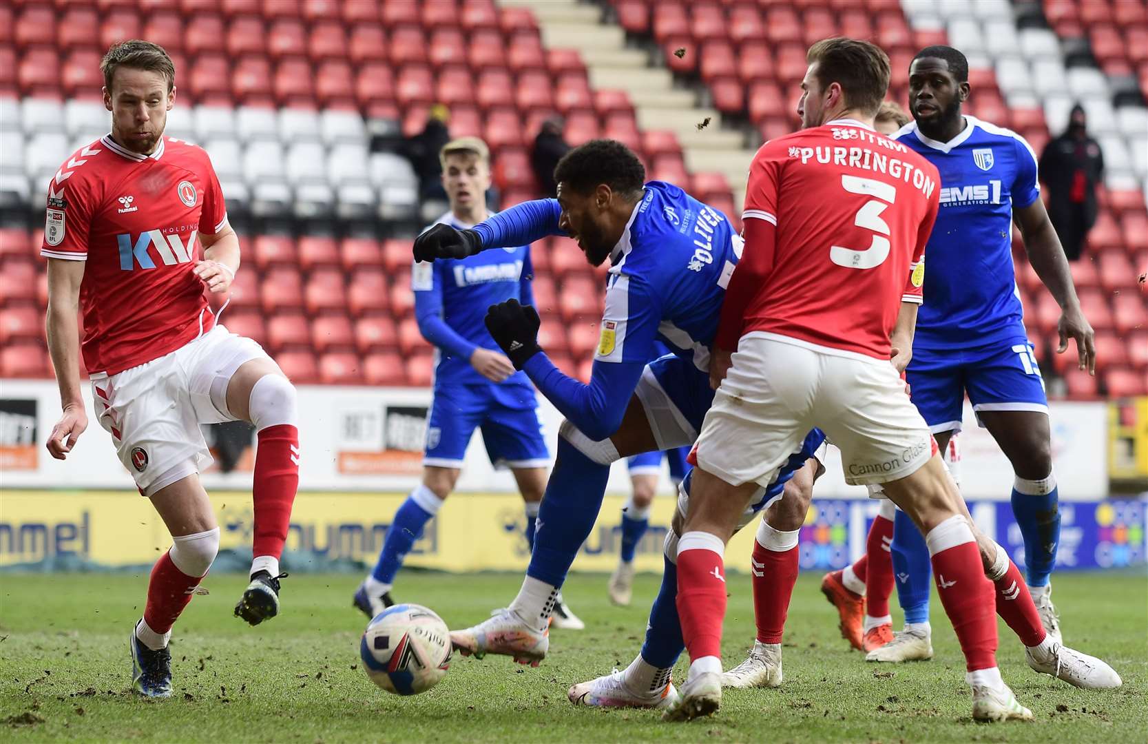 Gills striker Vadaine Oliver gets his shot away under pressure against Charlton. Picture: Barry Goodwin