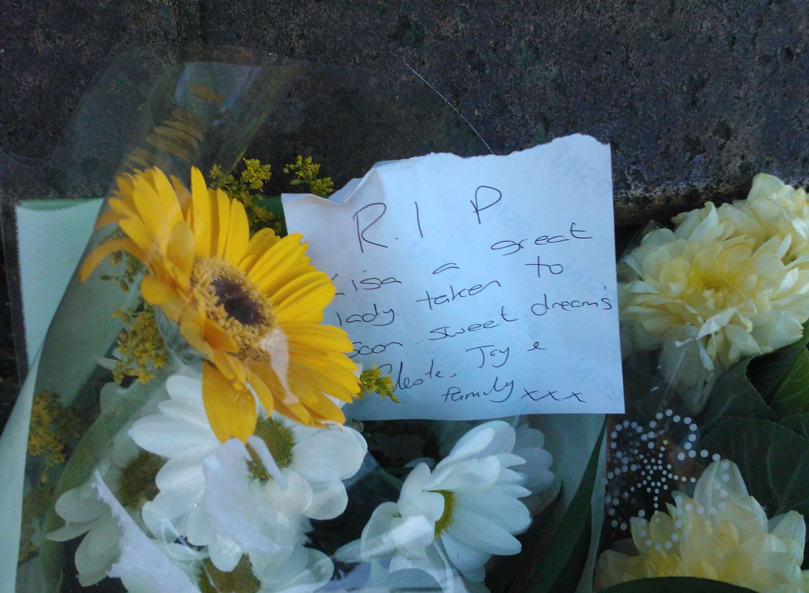 Floral tributes left at the scene following Lisa's death