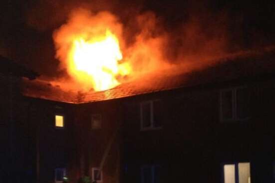 Firefighters tackle the blaze at student accommodation. Picture: @Kent_999s