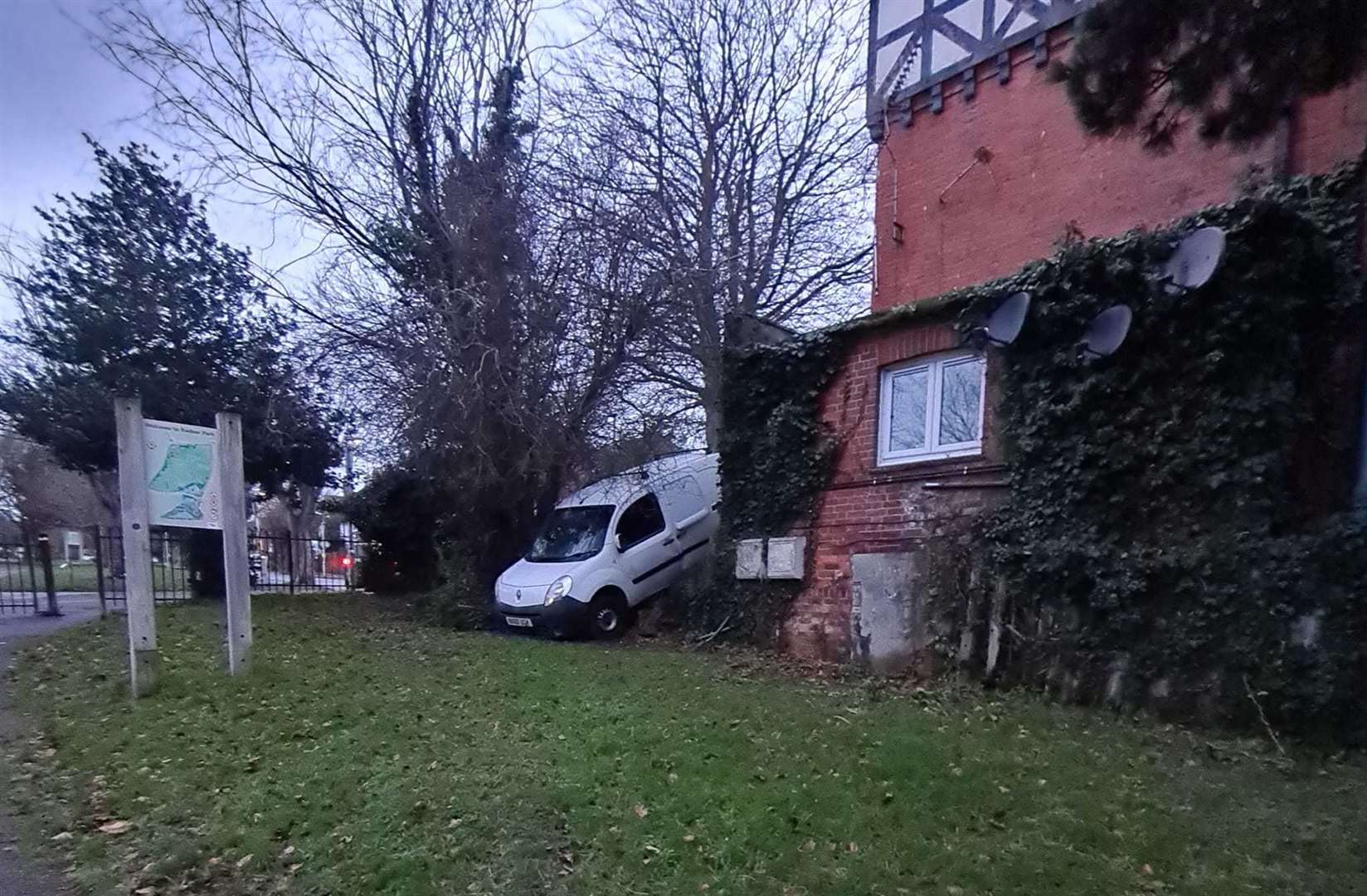 Van wedged in a hedge in Radnor Park, Folkestone. Picture: Mick Davis
