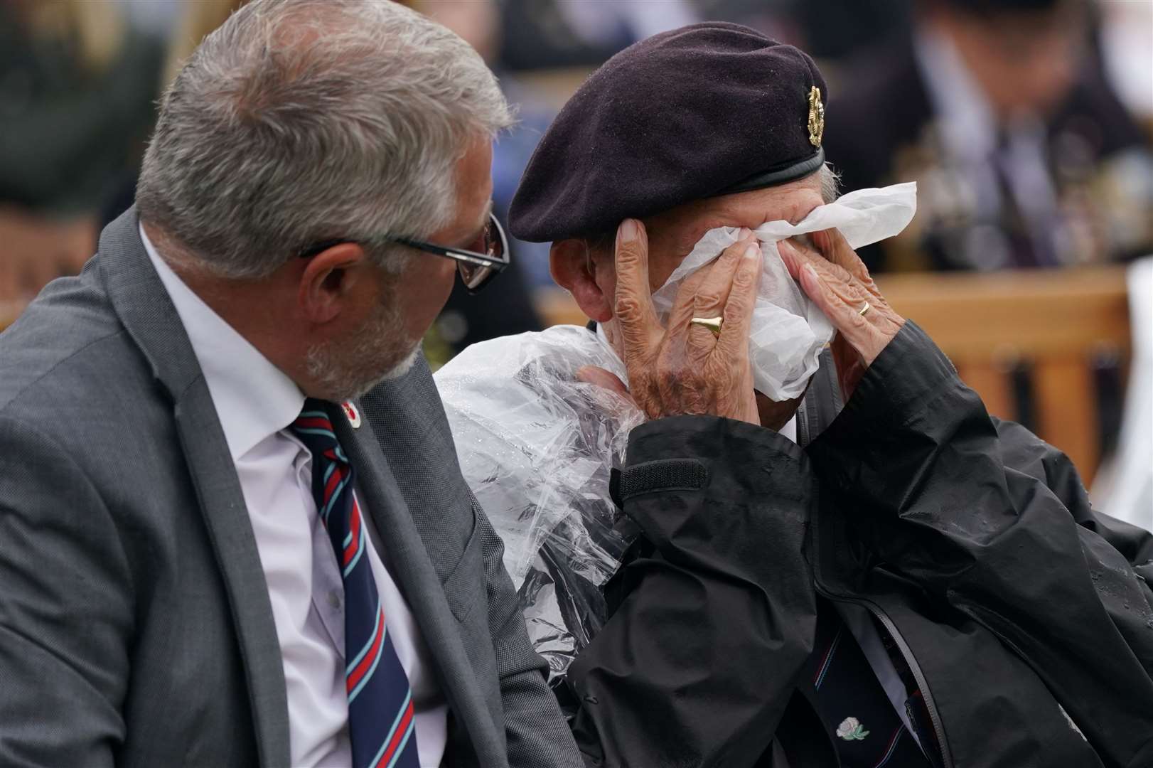 Veterans watch the official opening of the British Normandy Memorial via a live feed at the National Memorial Arboretum in Alrewas (Jacob King/PA)