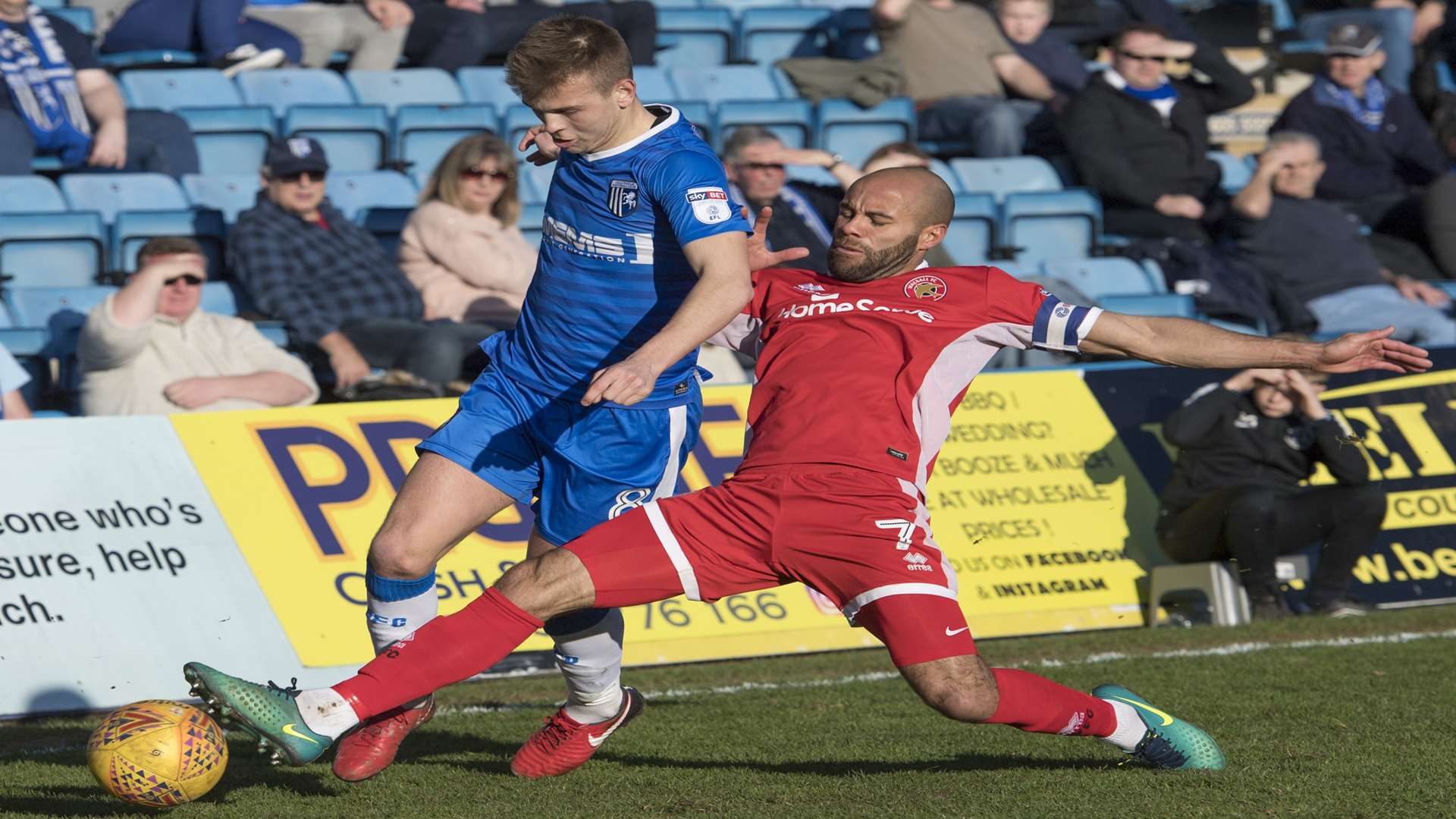 Jake Hessenthaler gets stuck in against Walsall Picture: Andy Payton