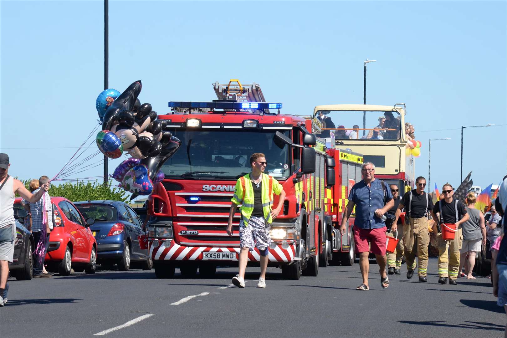 Margate's Kent Fire and Rescue lead the Margate Carnival on Sunday. Picture: Chris Davey. (3437100)