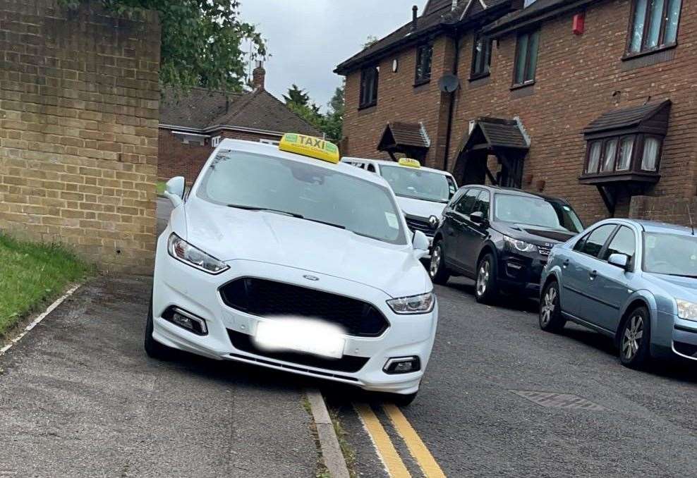 Taxis parked near Ripplevale School and College in Rochester. Pictures: Jeremy Fox