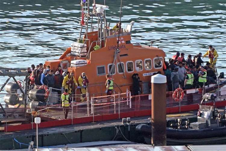 A group of suspected migrants being brought into Dover onboard the Ramsgate Lifeboat. Picture: Gareth Fuller/PA