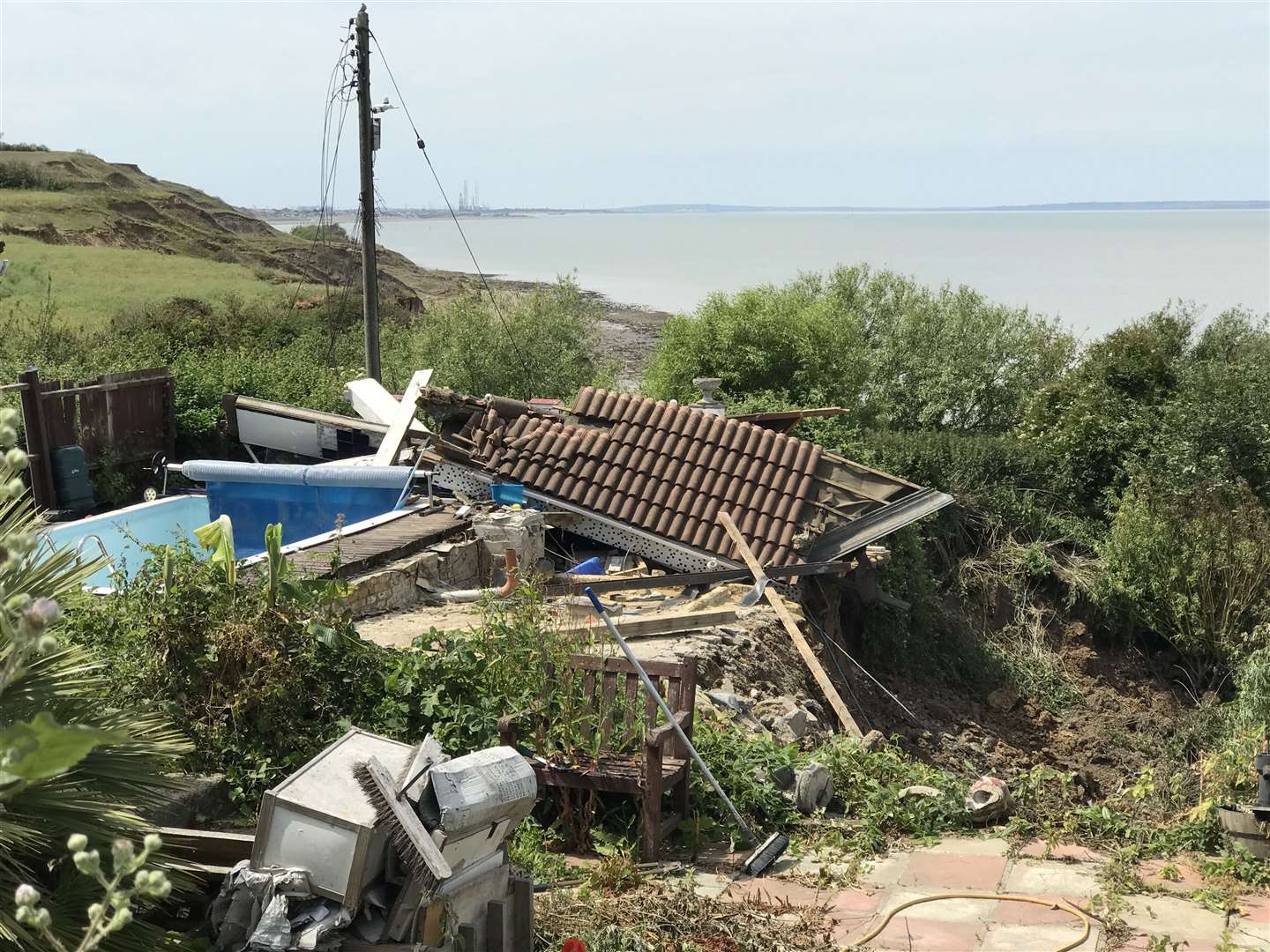 Emma Tullett's family home fell off the cliff at Eastchurch after a landslide left it teetering on the edge