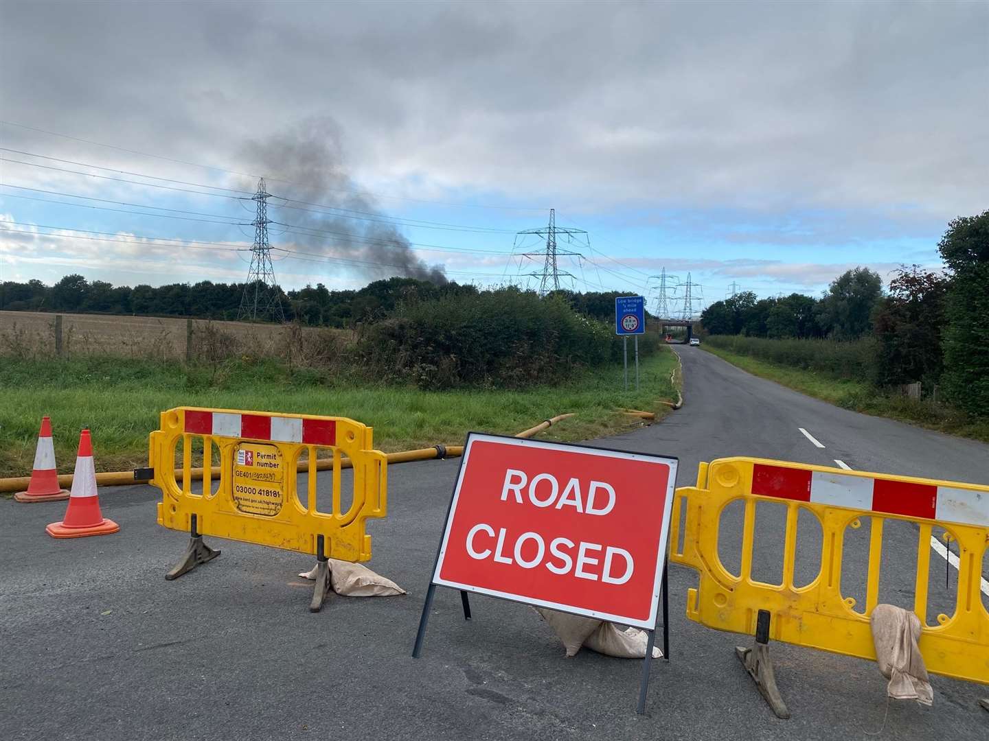 The road has been closed while fire crews work on the blaze. Picture: Barry Goodwin