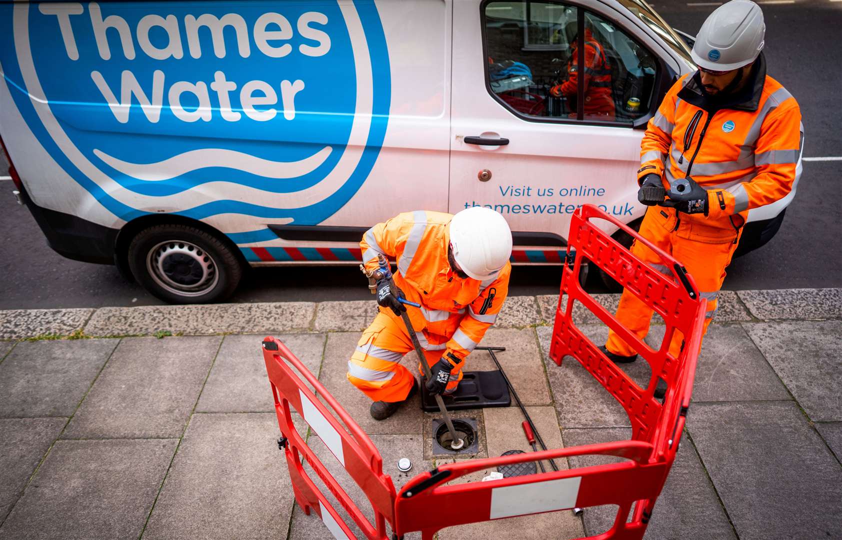 Engineers using a standpipe. Photo credit: Thames Water