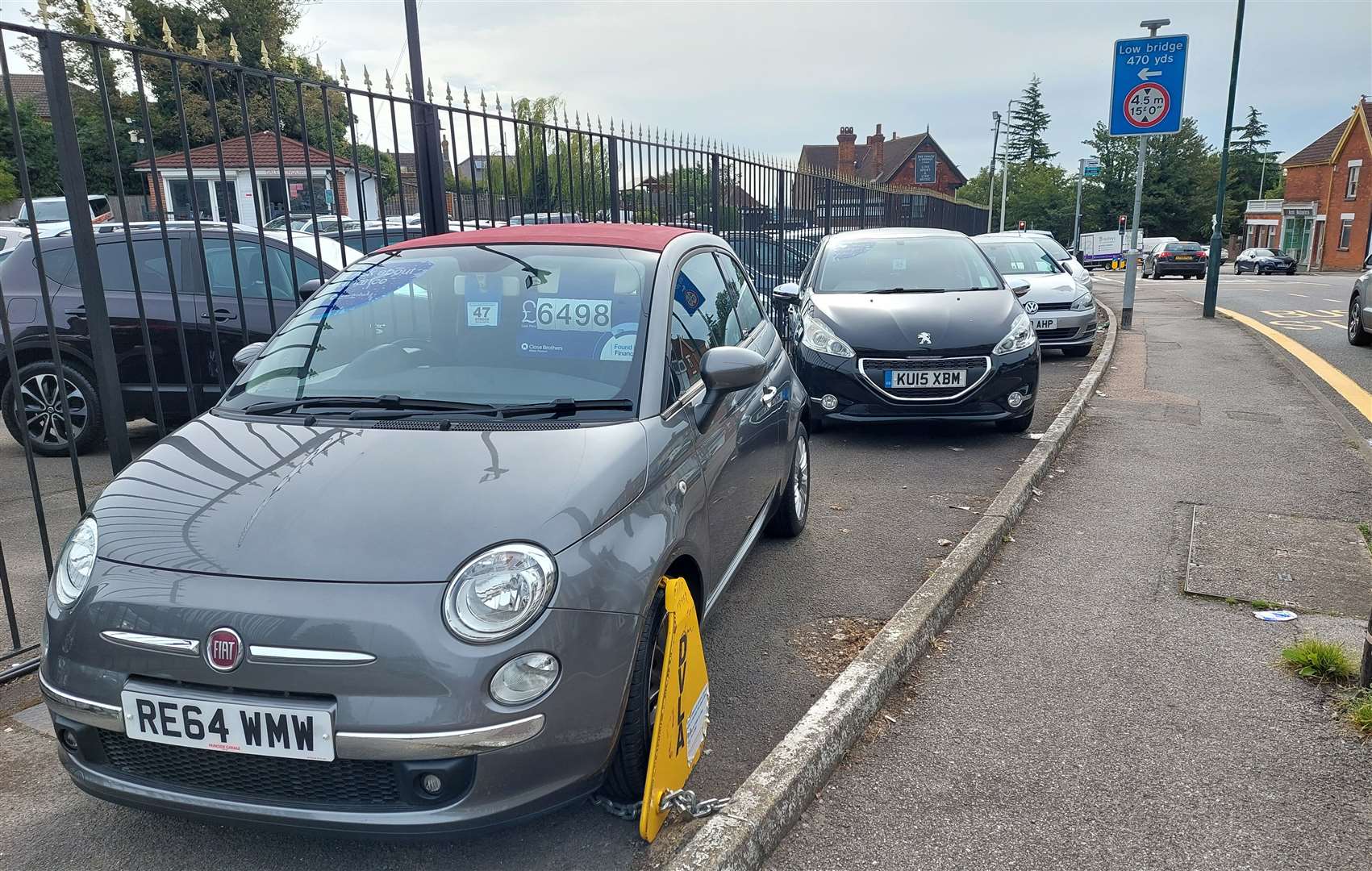 A Fiat 500 has been clamped at the car dealership. Picture: Max Mannouch