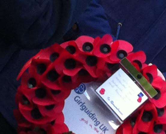 A guide laid a wreath of poppies on behalf of the Sandwich Girlguiding section