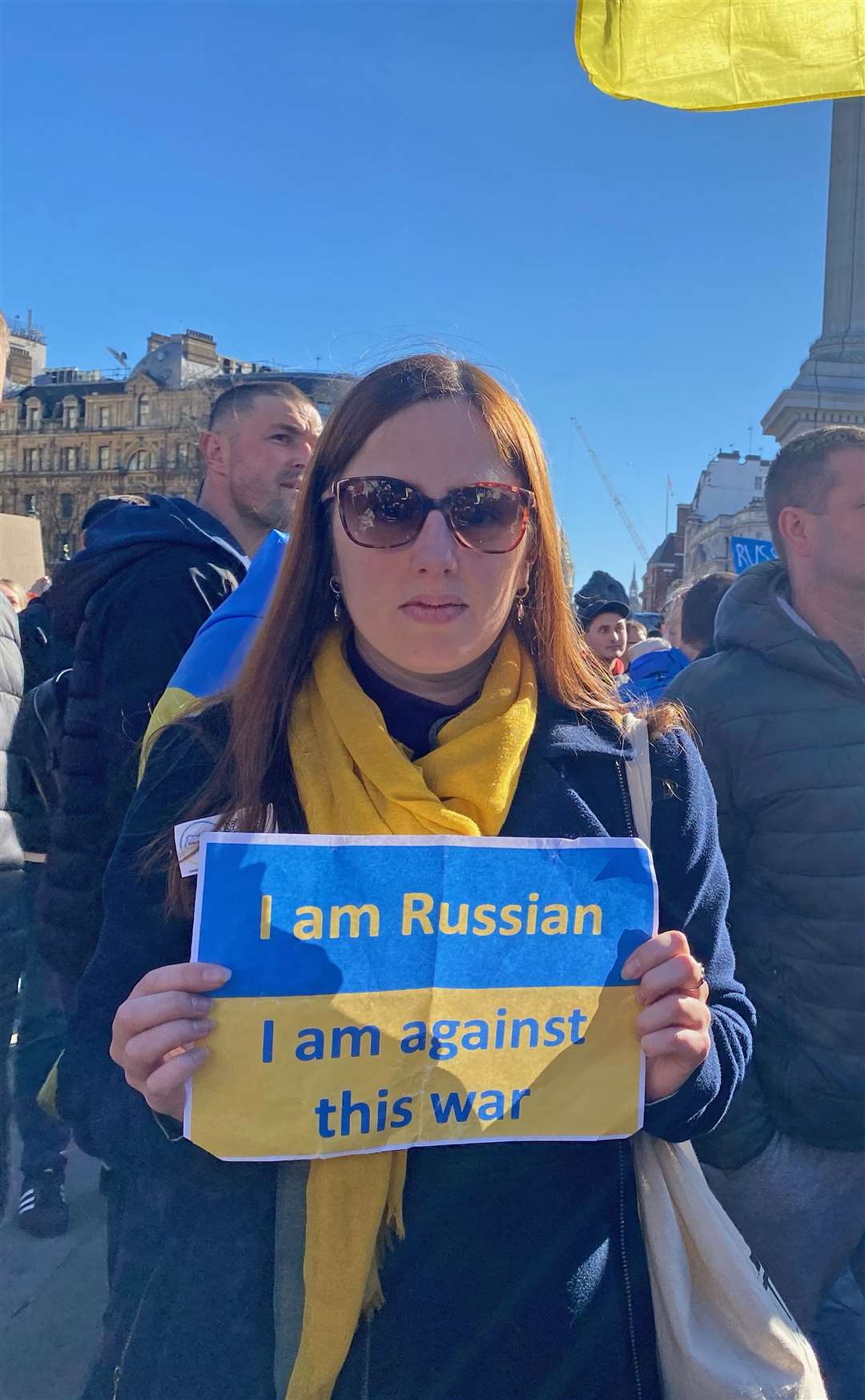 Maria Divid, 35, from Moscow takes part in a demonstration in Trafalgar Square, London, to denounce the Russian invasion of Ukraine (Rebecca Speare-Cole/PA)
