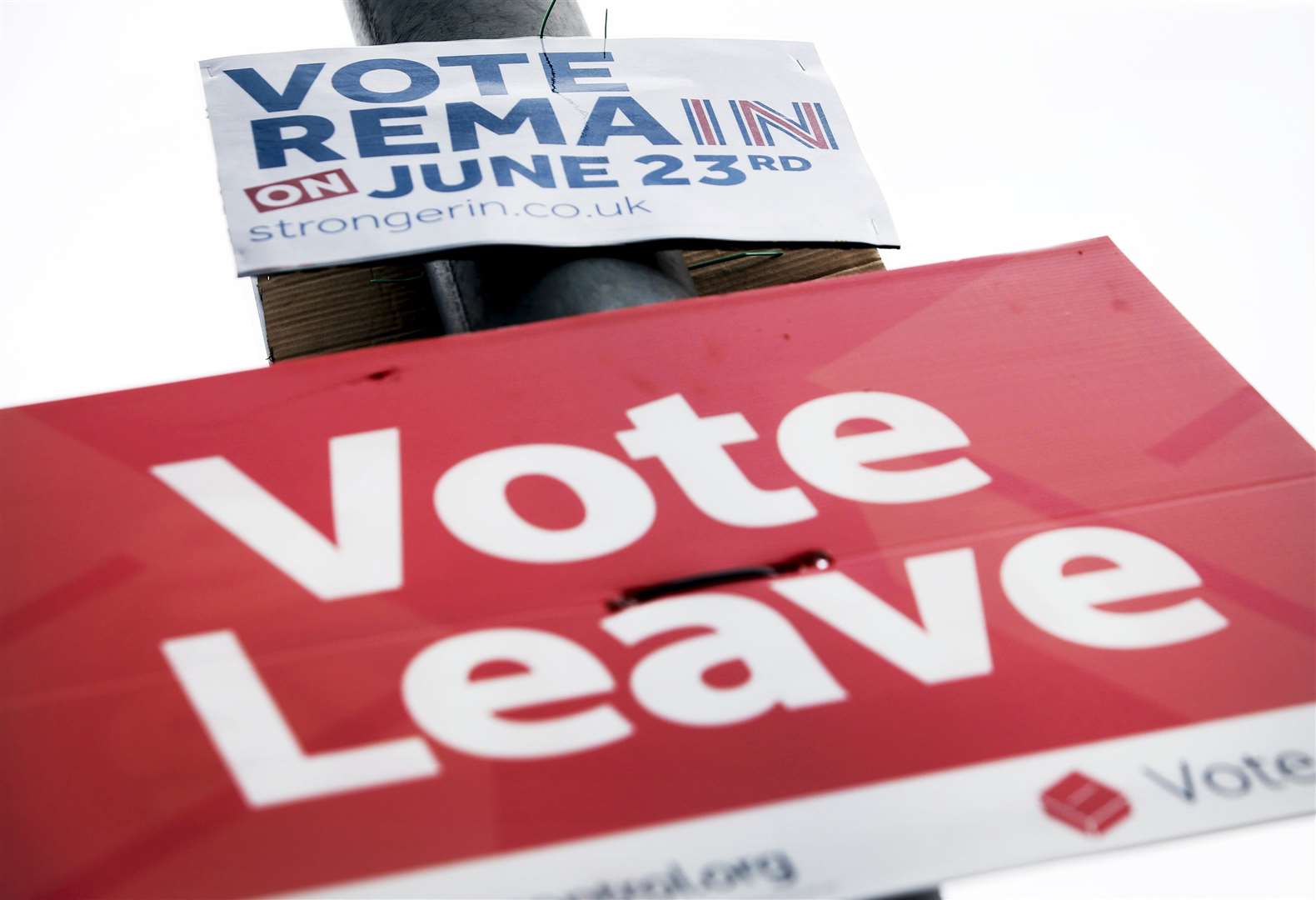 Vote Remain and Vote Leave signs on a lamp post in Leeds (Danny Lawson/PA)