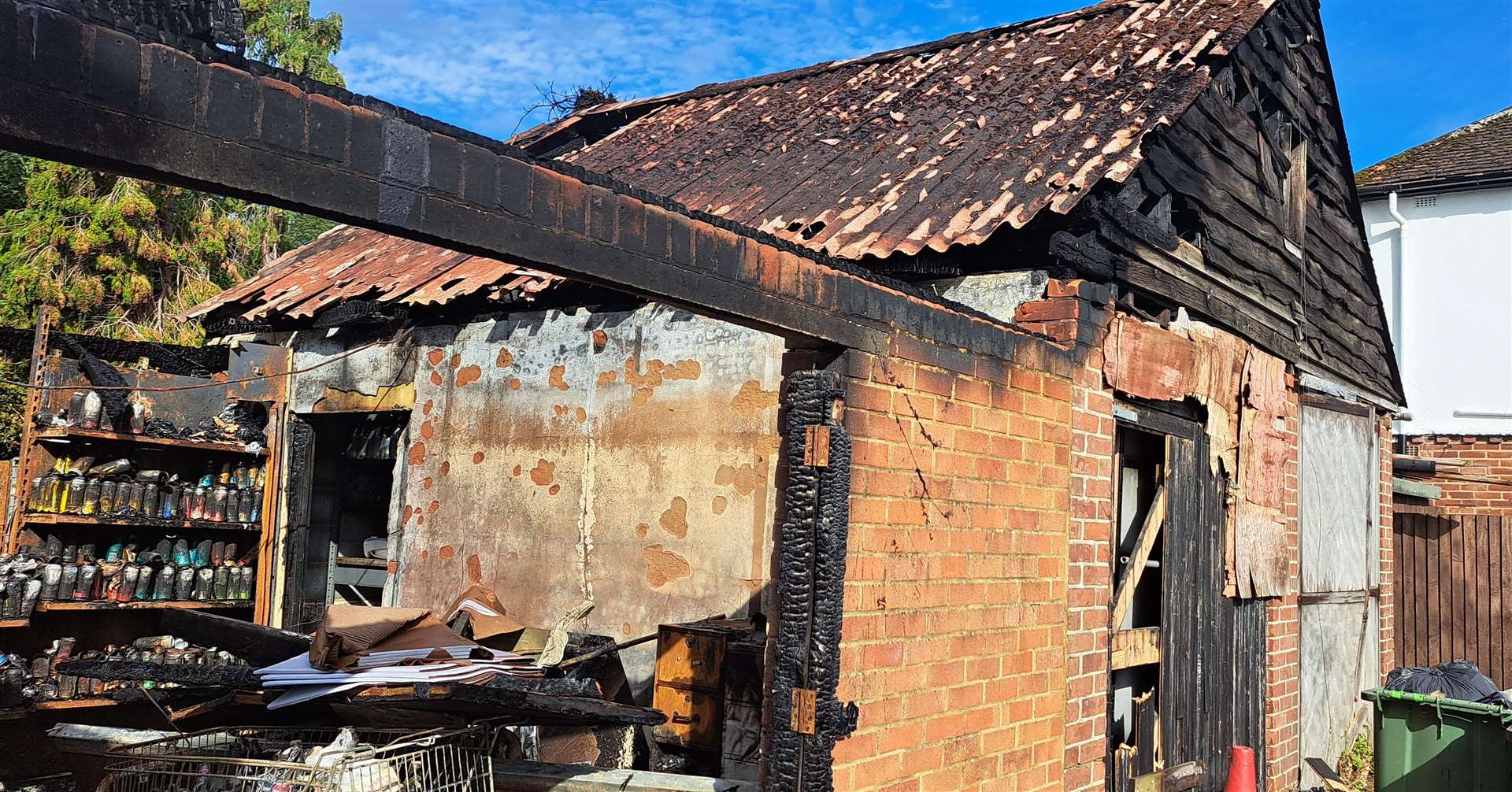 The damaged outbuilding following the fire at Best One in Barming