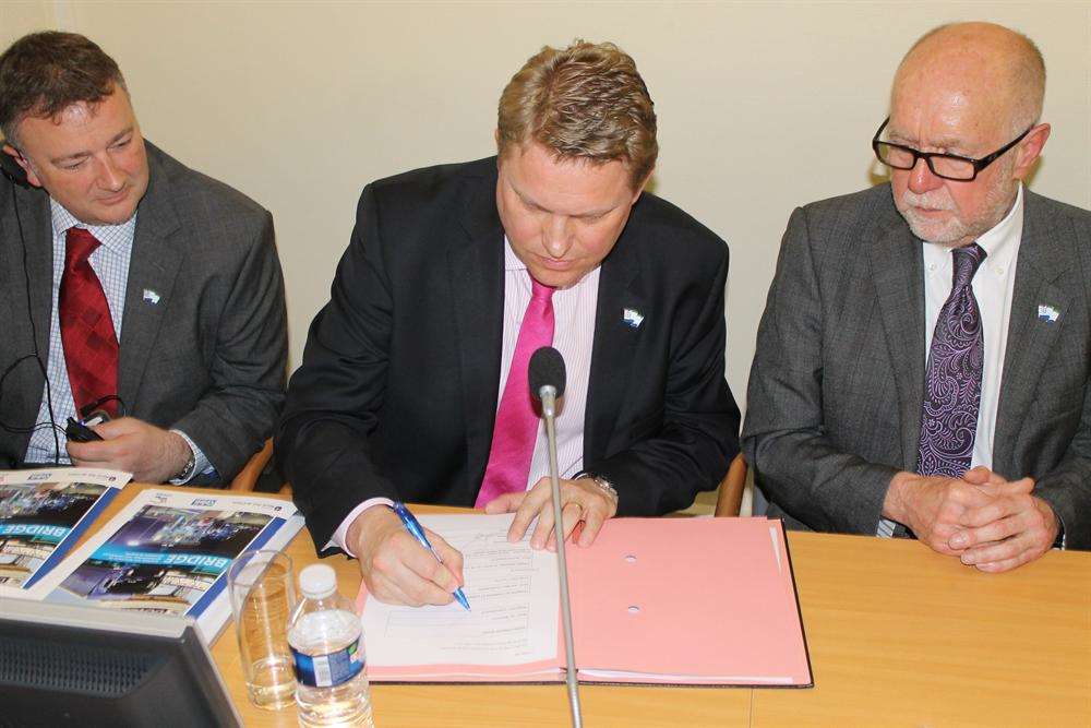 Dover Harbour Board sign the memorandum of understanding with the Port of Calais. From left, finance director Shaun Pottage, chief executive Tim Waggott and chairman George Jenkins