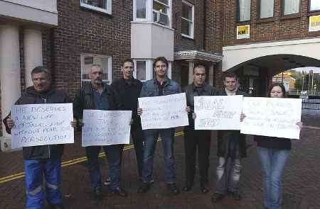 SUPPORT: Wellwishers outside the newspaper offices today