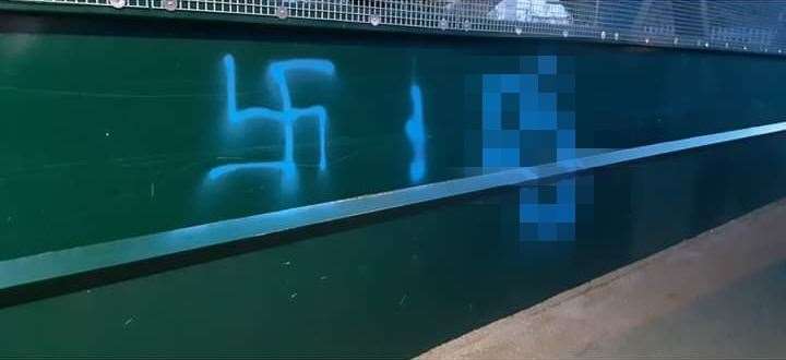 Nathan Tough painted over the graffiti with white paint (20313626)