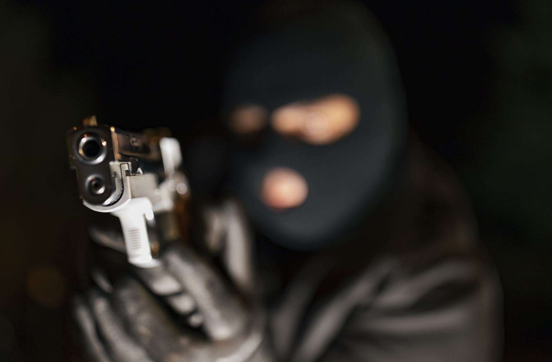 A couple woke up to find a burglar pointing a gun at them while they were in bed. Stock image: iStock/RealPeopleGroup