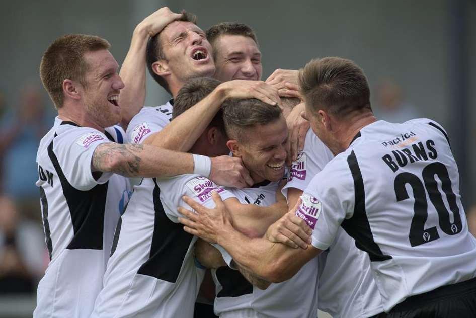 Adam Birchall is mobbed by his Dartford team-mates (Pic: Andy Payton)