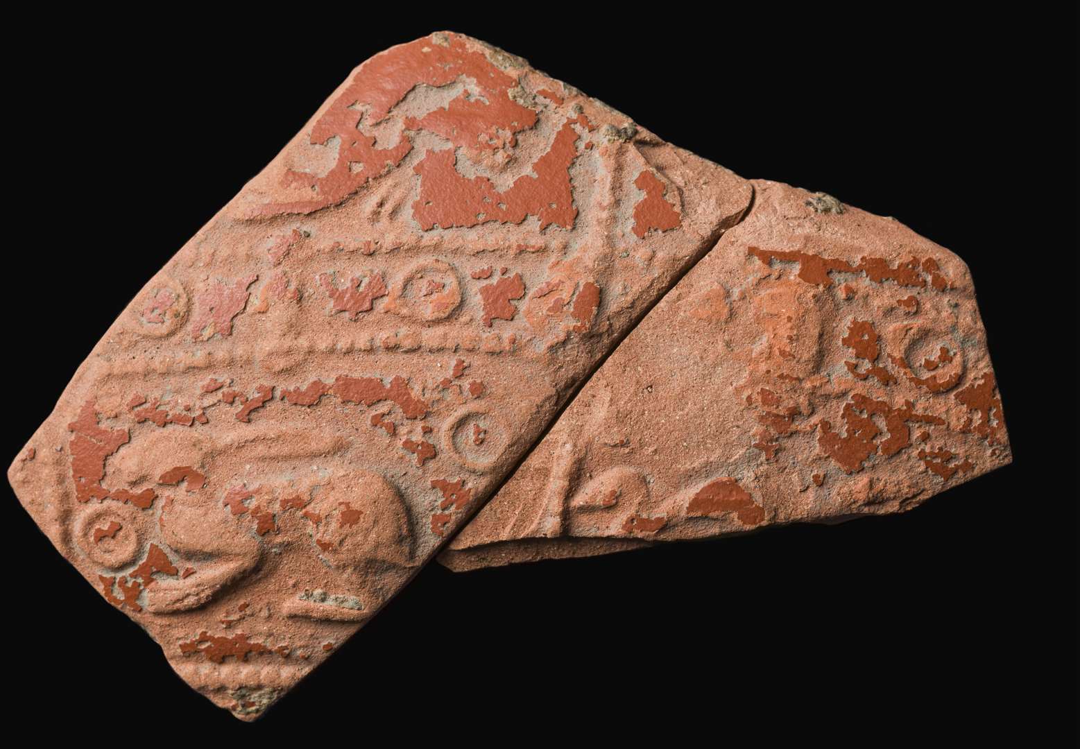 Worn fragments of decorated Roman Samian ware, a form of pottery. Picture: National Trust Images: James Dobson