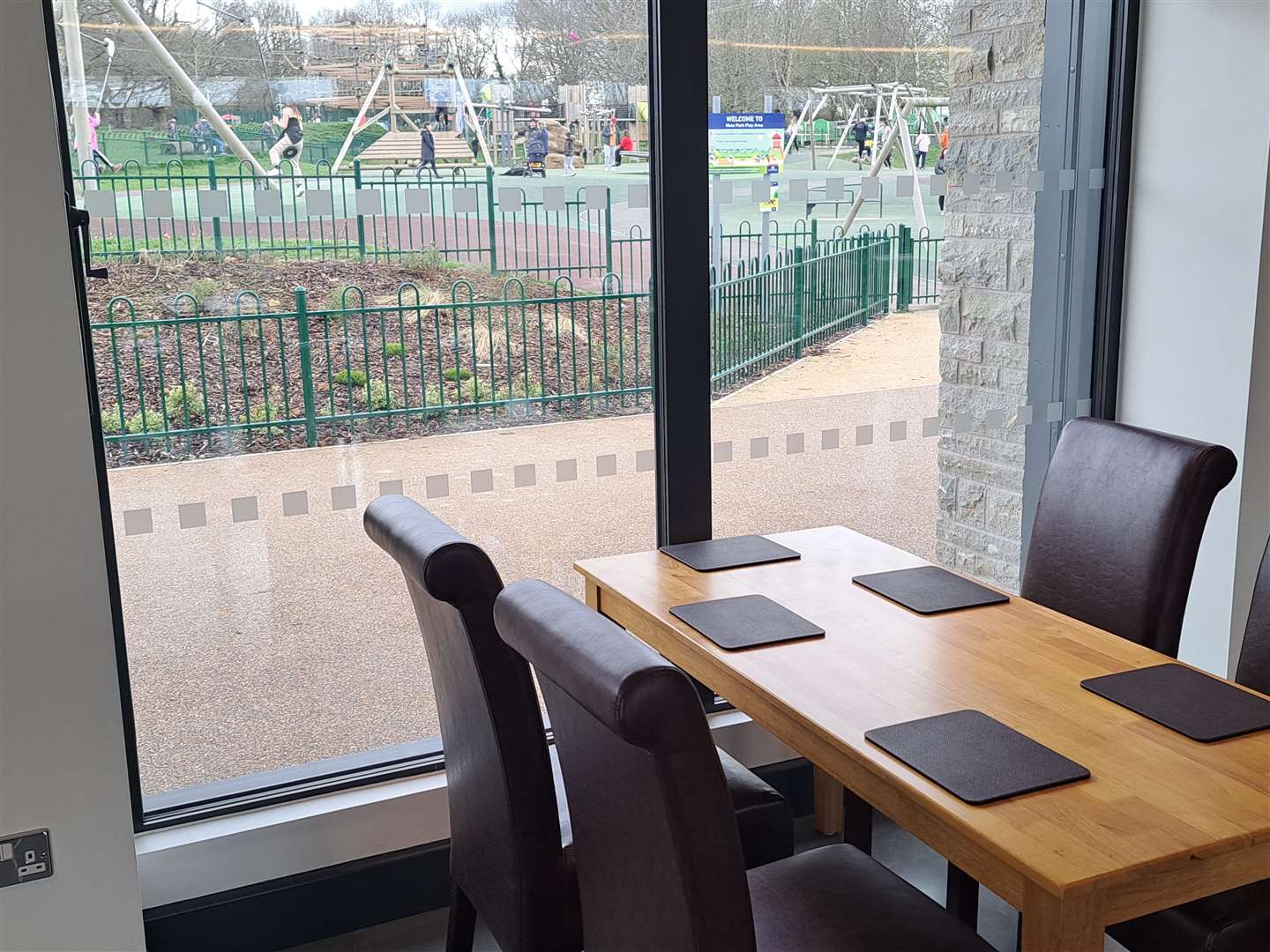 The cafe has views of the play area