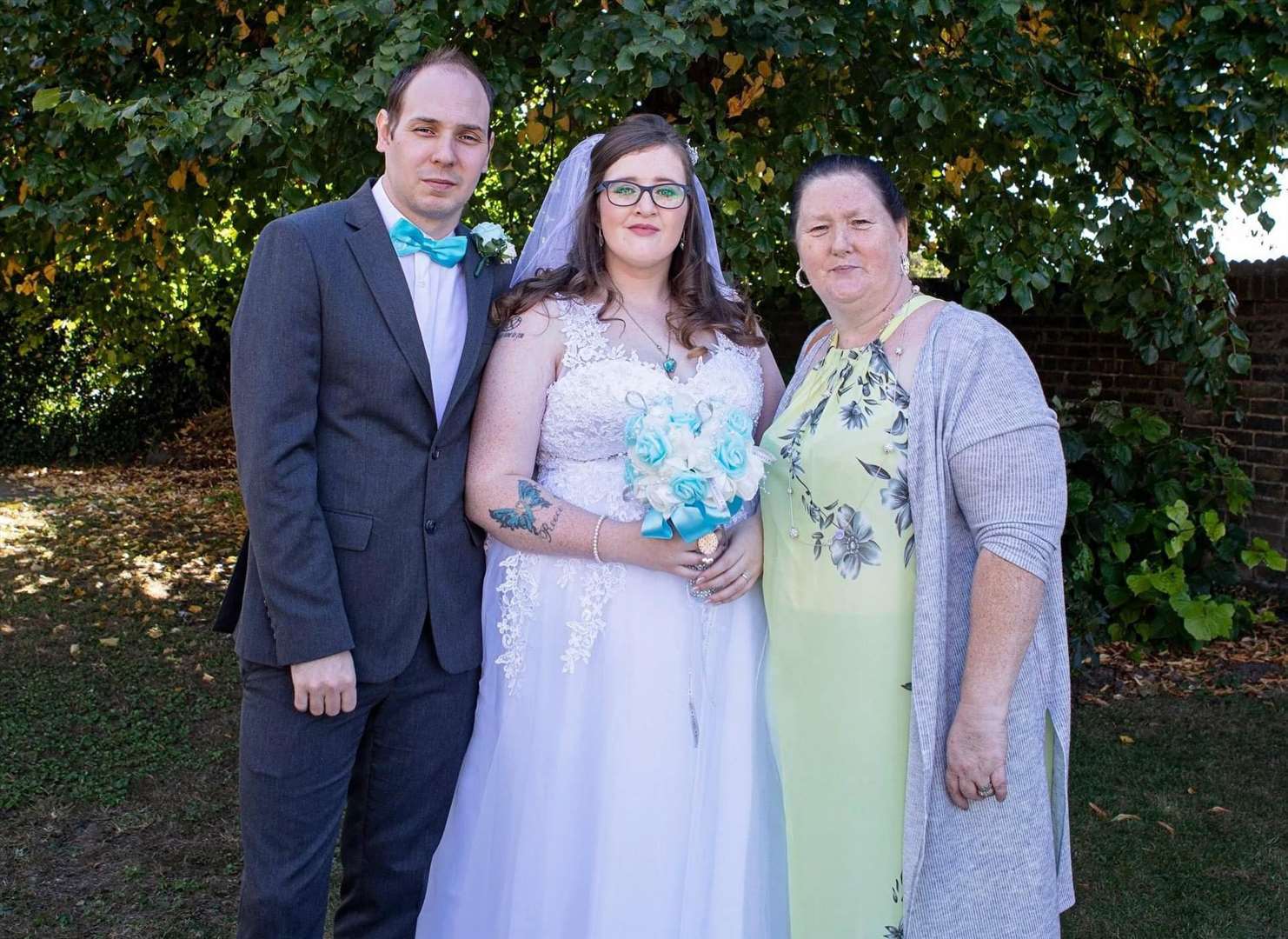 Lorraine with son John and his wife Caitlin on their wedding day