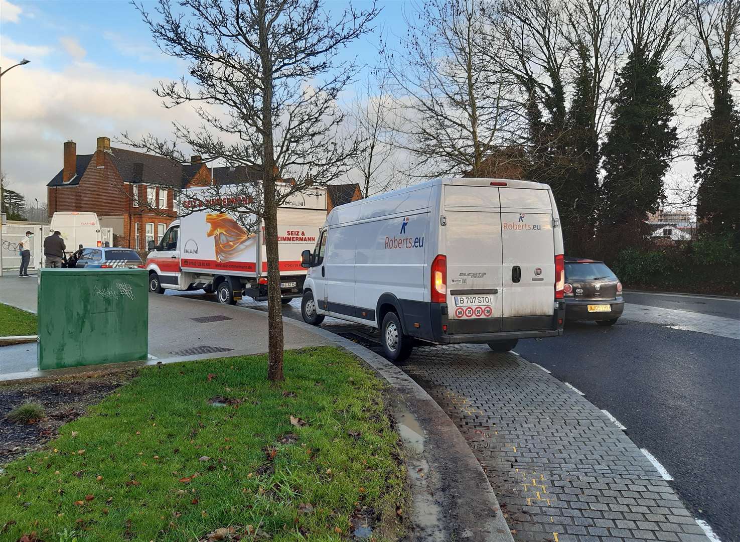 Vehicles have been parked at the roadside outside Victoria Road Primary School