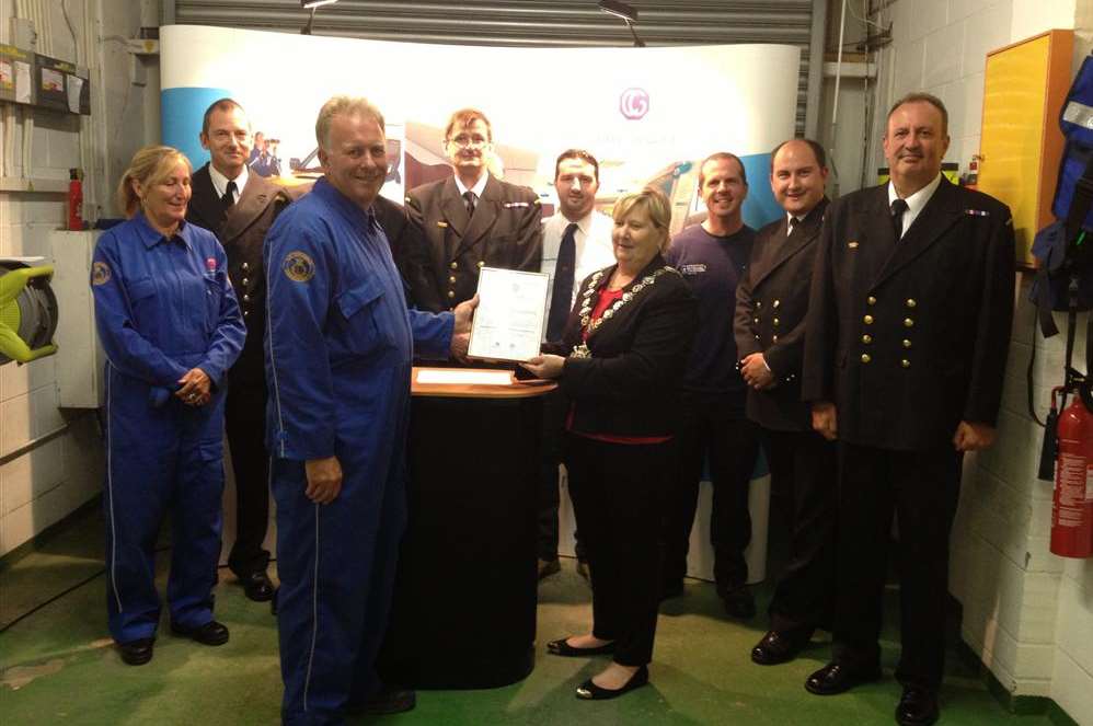 Sheppey Coastguard officers are presented with their medal by Mayor of Queenborough Sue Simpson