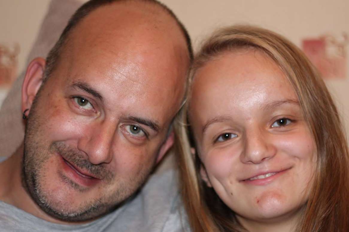 Sophie Drogomirecki, 15, with her dad Chris, 43, who suffers from cauda equina syndrome, a serious neurological condition. Sophie won a Ward and Partners Children's Award in 2013 in the category for young carers.