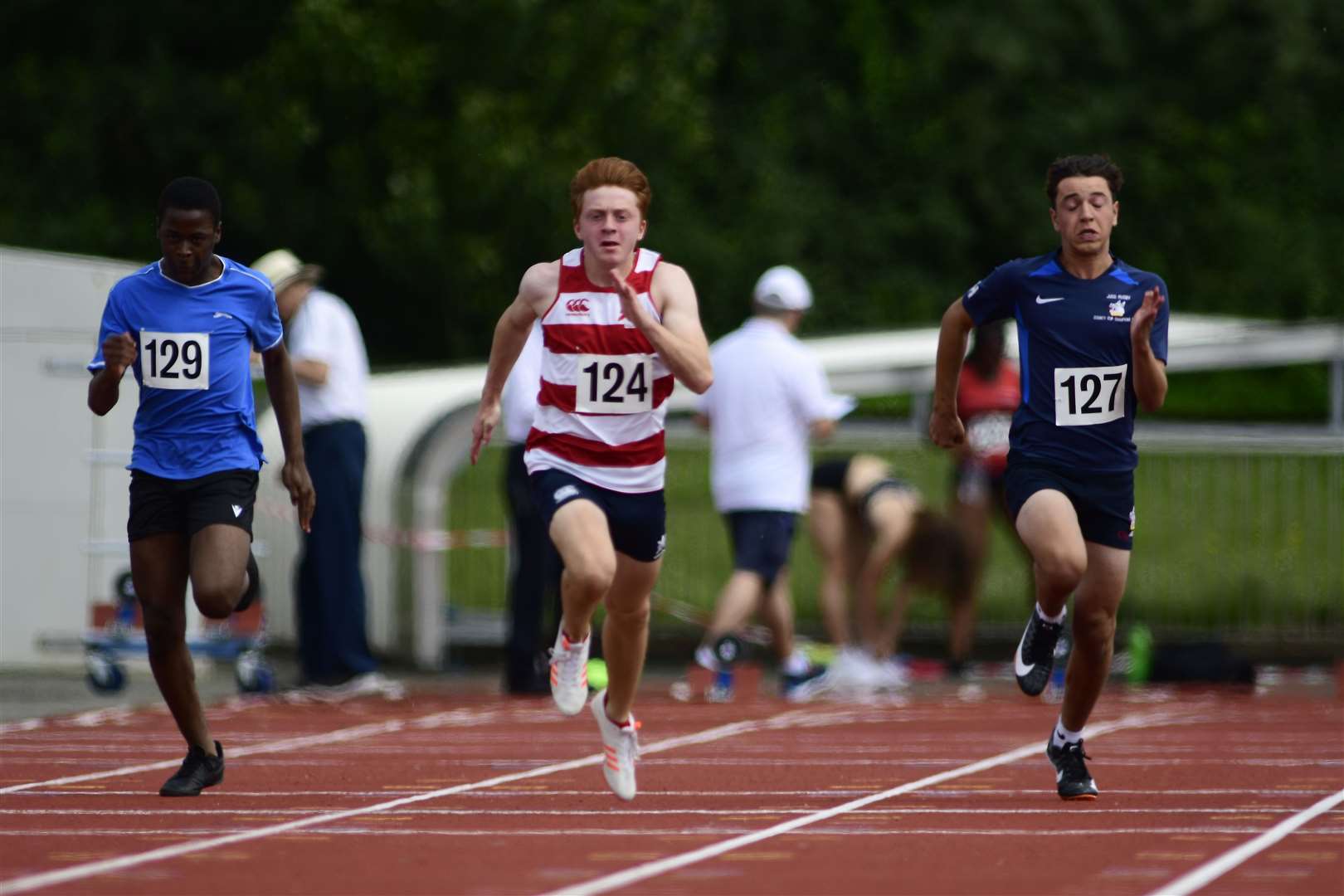 David Ogbedeh (Bromley), Oliver Ebsworth (Sevenoaks) and Cameron Honarvar (Tonbridge) battle it out in the 100m Picture: Barry Goodwin