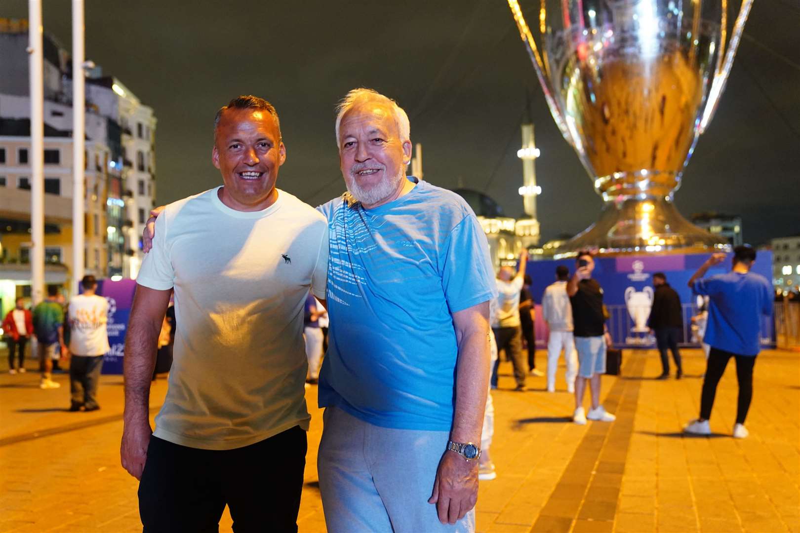 Manchester City fans, father and son, Kevin (left) and Liam Ryan, in Taksim Square in Istanbul (James Manning/PA)