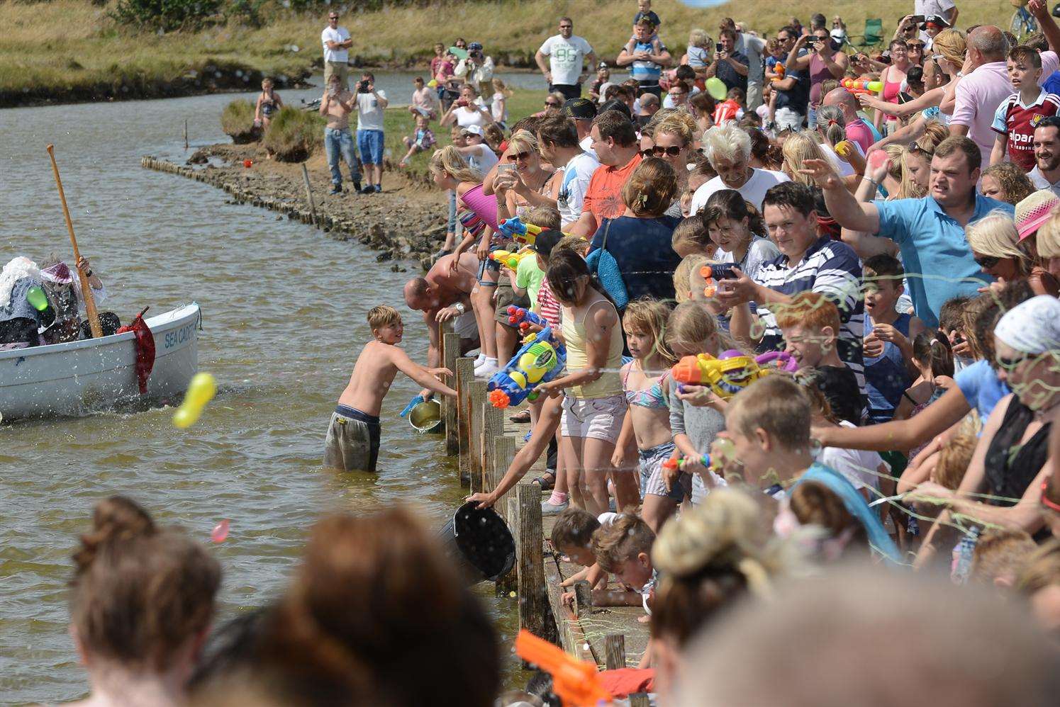 Hundreds of people took on the Sheppey Pirates in a water fight but they still managed to land ashore