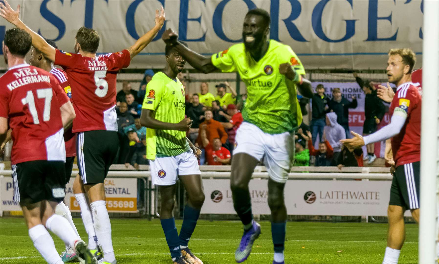 Ebbsfleet's Ouss Cisse (right) scored the equaliser against Woking in midweek. Picture: Ed Miller/EUFC