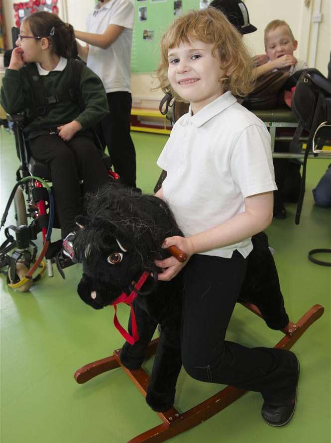 Faye, 6. Abbey Court School is aiming to raise money for a Horse Simulator