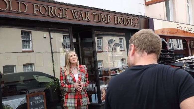 Presenter Caroline Hawley outside the Old Forge Wartime House