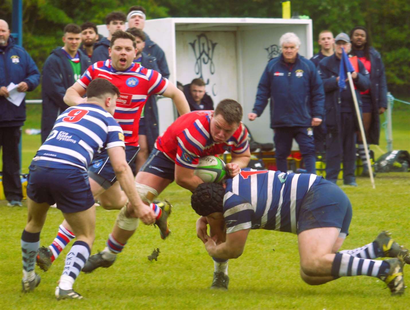 Tonbridge Juddians' Will Holling halted by Westcombe Park. Picture: Adam Hookway