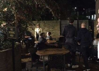 The weather was mild enough to ensure there were still plenty of people choosing to opt for a seat in the outside area on the left at the back of the pub