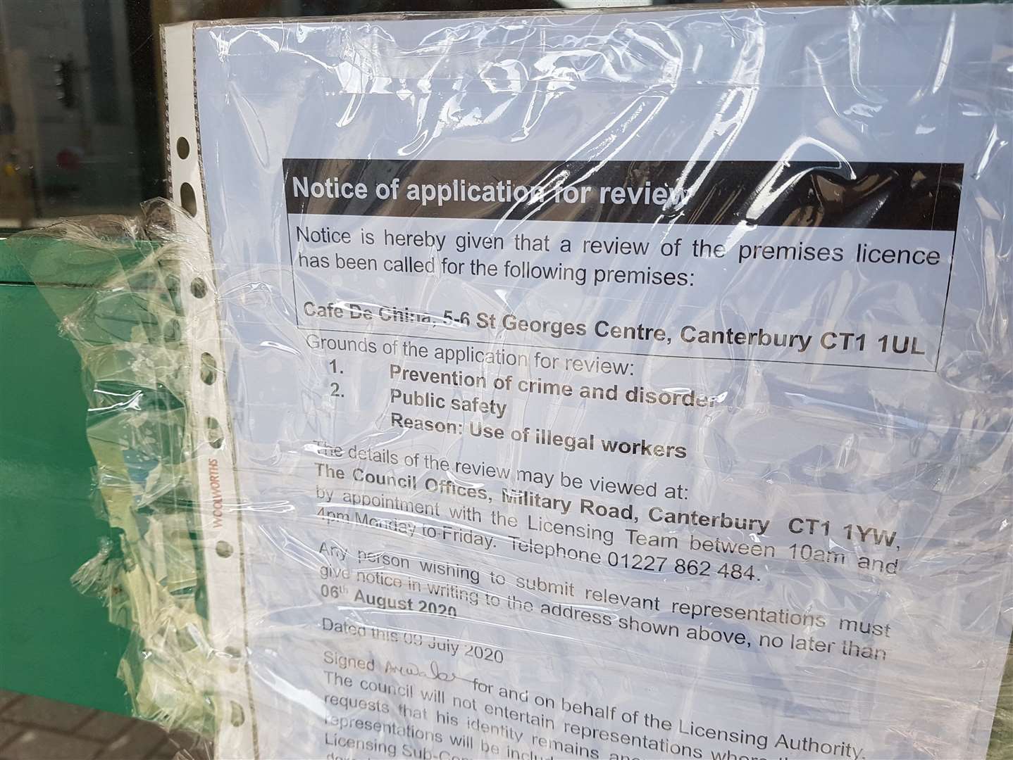 The notice of application for review on Cafe de China's door