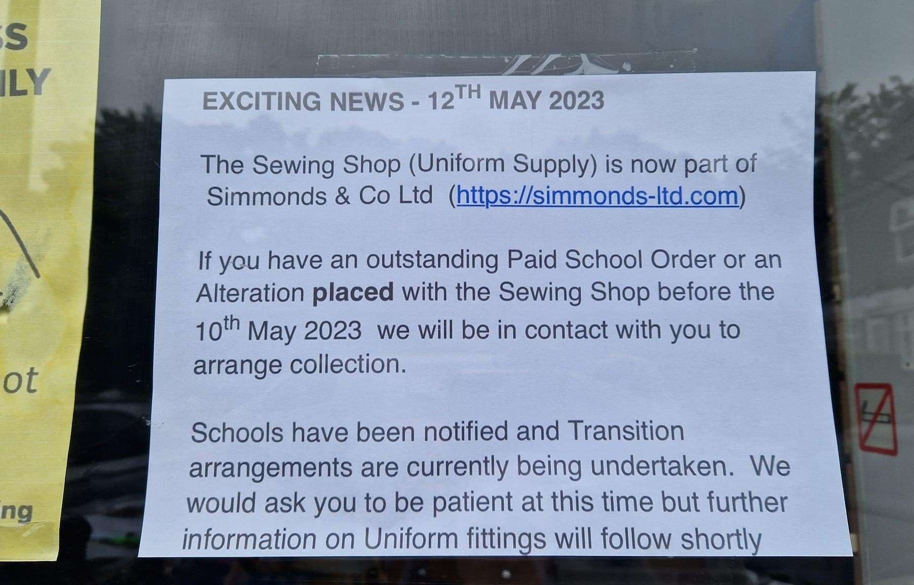 The sign in the uniform shop which announced the closure